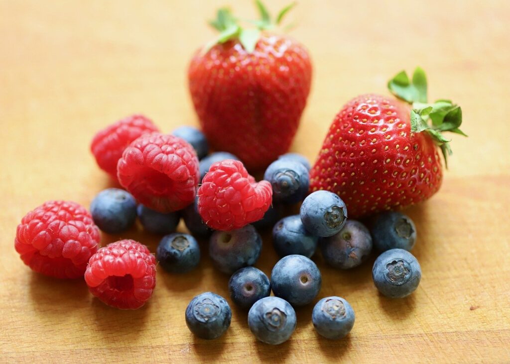 raspberries, blueberries, strawberries-8664278.jpg